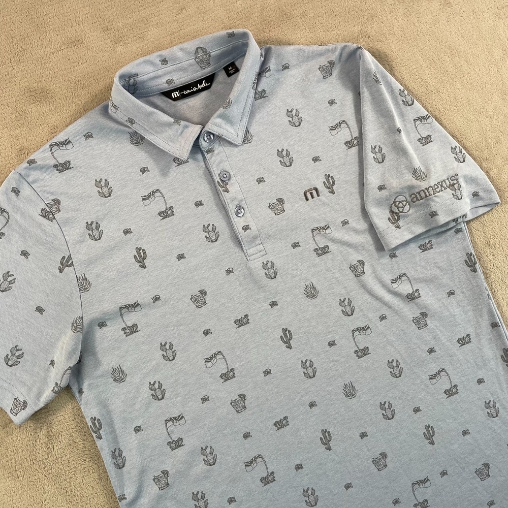 TravisMathew Panning For Gold Polo Shirt Men Medium Blue Corp anexus Health NWOT